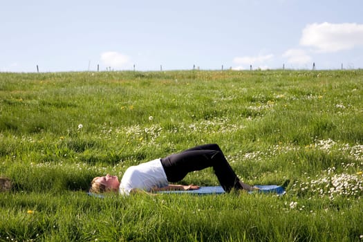 Woman doing bridging exercises