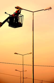 An electrical power utility worker