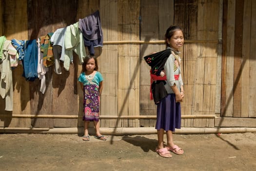 Hmong girl with brother,Laos