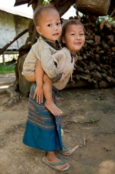 Hmong girl with brother,Laos