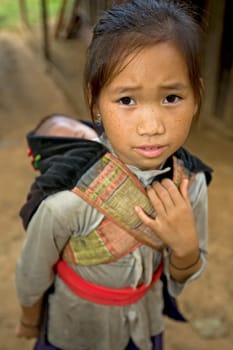 Hmong girl with brother,Laos