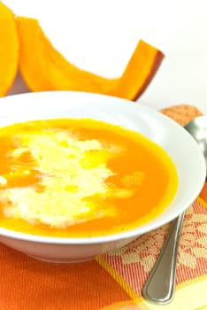 Pumpkin soup with whipped cream