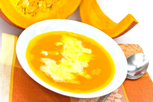 Pumpkin soup with whipped cream