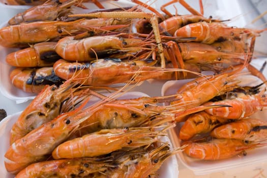 Prawns grilled on paper plate