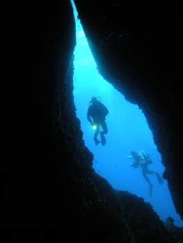 Diver at the cave entrance
