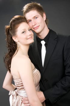 Portrait of a young beautiful couple embracing.