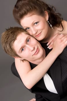 Portrait of a young beautiful couple embracing.