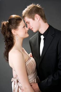 Portrait of a young beautiful couple embracing.