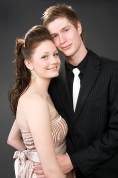 Portrait of a young beautiful couple embracing.