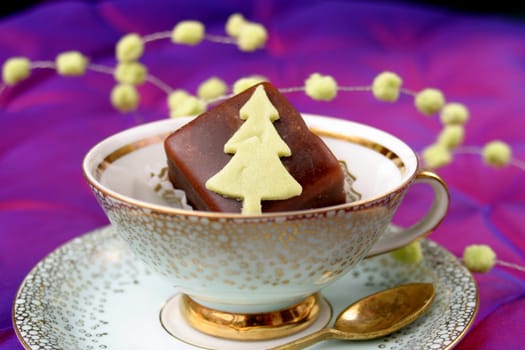 Christmas cup with dominoes