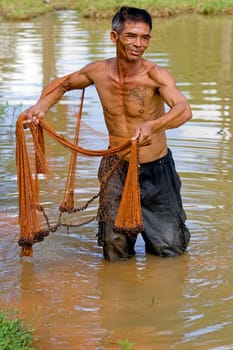 Fisherman of Thailand with casting net