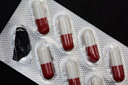 Pills in plastic container
