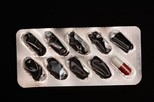 Silver package of pills spent