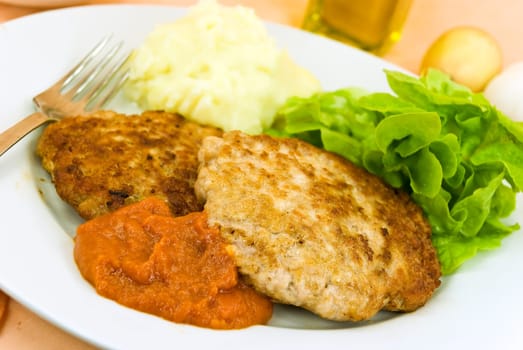 Meatballs with puree,tomato sauce