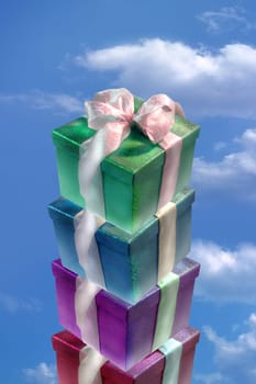 pile of gift boxes and blue sky