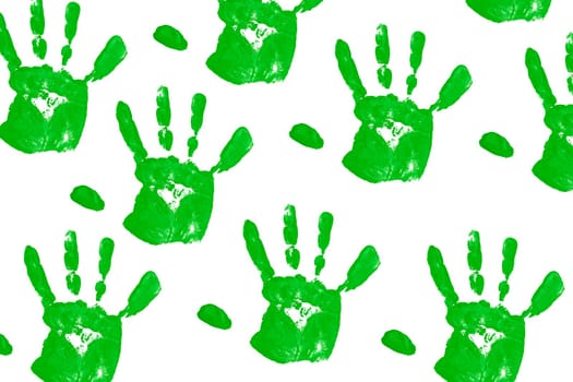 close up green child handprints on white