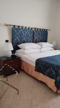 Cozy elegant bedroom furniture room interior design decor decorations objects house hotel apartment bed blue white lamp . High quality photo