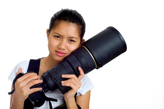 Young asian woman with camera and telephoto