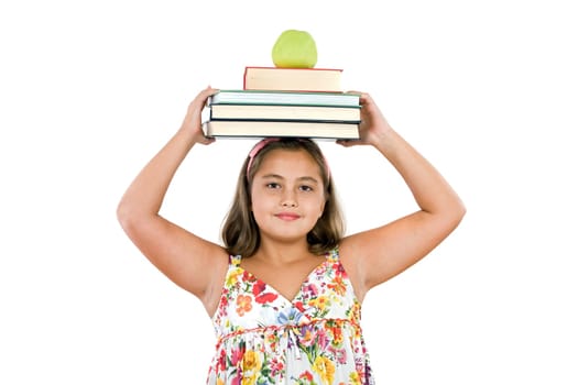 Adorable girl studying with books
