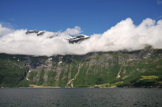 Ribbon of clouds at Hardangerfjord / Norway.