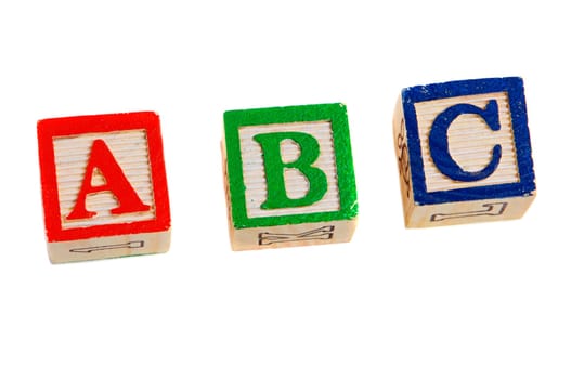 Three toy wooden blocks
