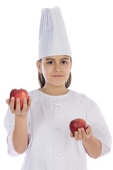 Adorable cook girl with apples