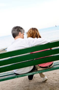 Mature romantic couple on a bench