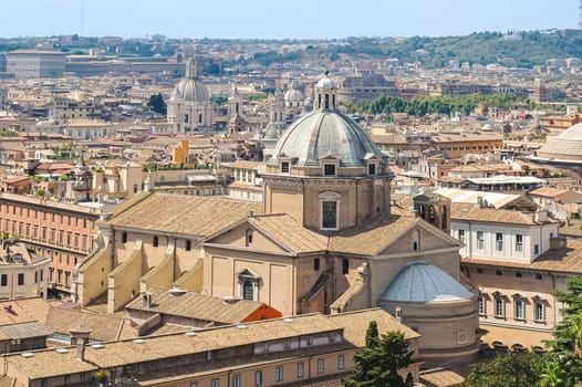 Panoramic view of Rome from the Vittoriano with the Church of the Gesu, seat of the Jesuit order, in the foreground, with the dome of Saint Agnes in Piazza Navona in the background