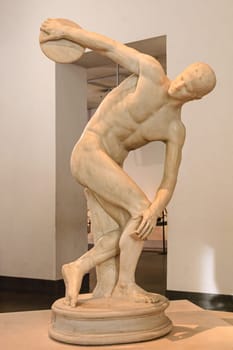Rome, Italy, August 22, 2008: Discobolo. Athlete about to throw the discus. Roman copy from the century II AD of a Greek original from the century V BC made by Myron. Palazzo Massimo. National Roman Museum