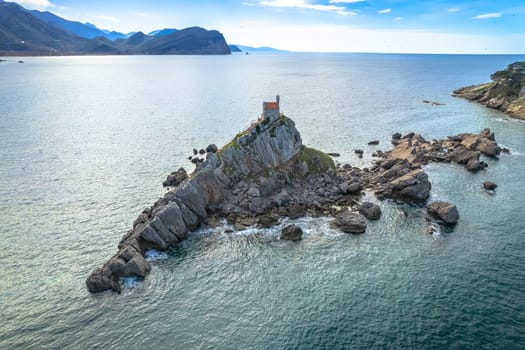 Church on the rock on Katic islet in Petrovac aerial view, archipelago of Montenegro