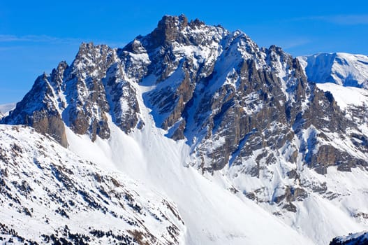 Majestic Alpine peak in winter