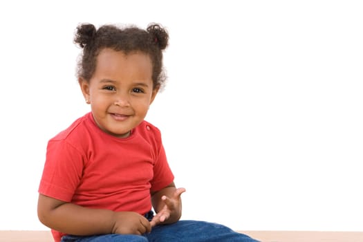 Adorable african baby sitting