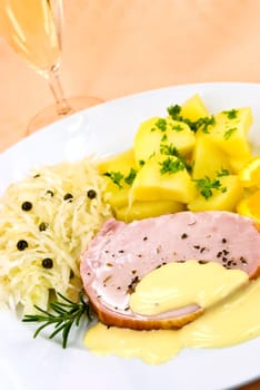 Kassel with potatoes,sauerkraut,sparkling wine