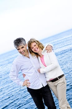 Mature romantic couple at seashore