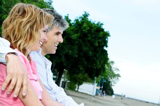 Mature romantic couple on a bench