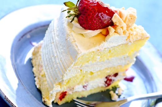 Slice of strawberry meringue cake