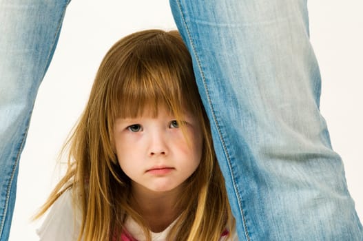 little girl between legs