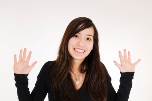 smiling girl hands up