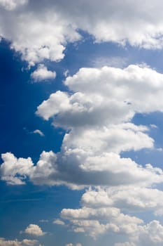 Blue sky with clouds upright