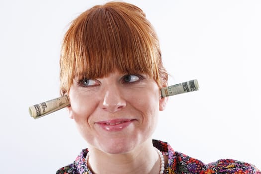 Rolled money in ears