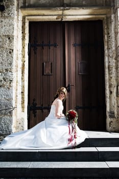 Another bride in front of the church gate