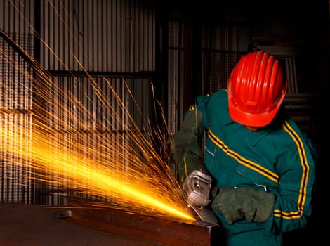 heavy industry manual worker with grinder 03