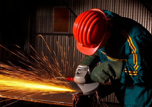 heavy industry manual worker with grinder 02