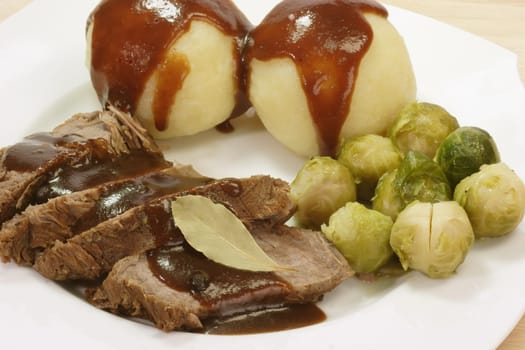 Roast beef with dumplings