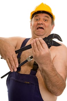 Plumber with pipe wrench and safety helmet