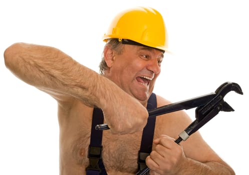 Plumber with pipe wrench and safety helmet