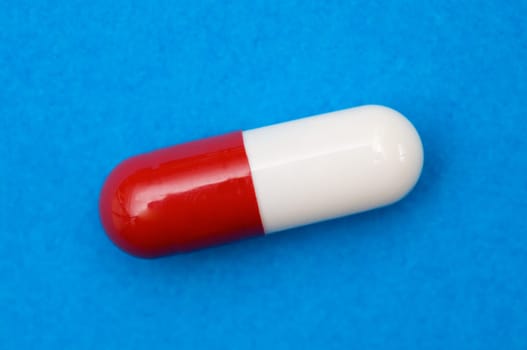 Red and white pill
