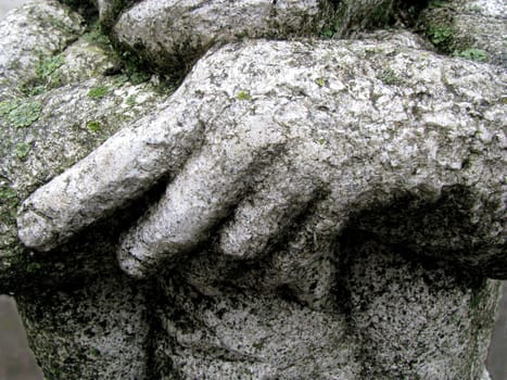 Stone sculpture with hand