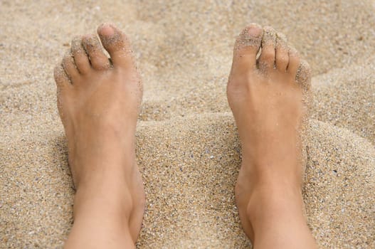 feet in the sand
