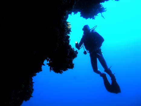Diver on steep wall